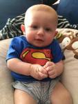 Baby in Superman shirt